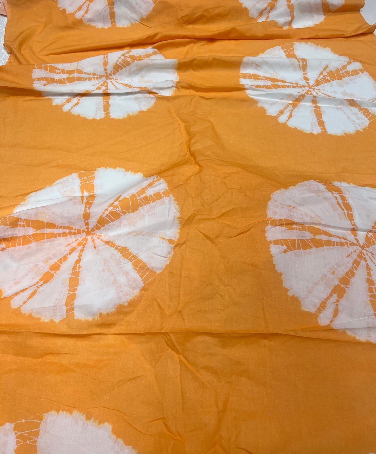 Orange Circular Burst Lawn Cotton ₹280/- per meter