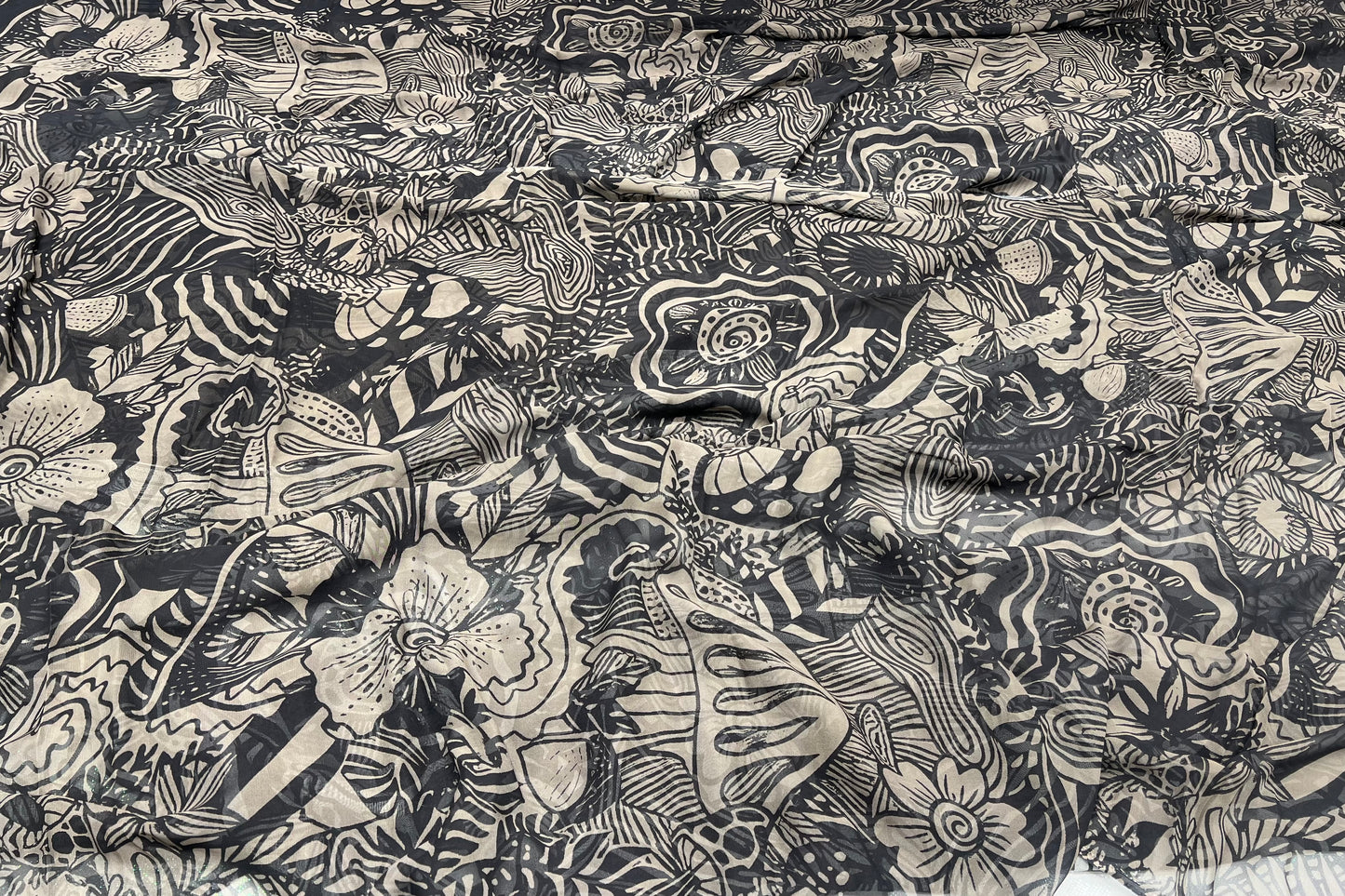 Monochrome Tribal Sketch Viscose Georgette ₹380 per meter