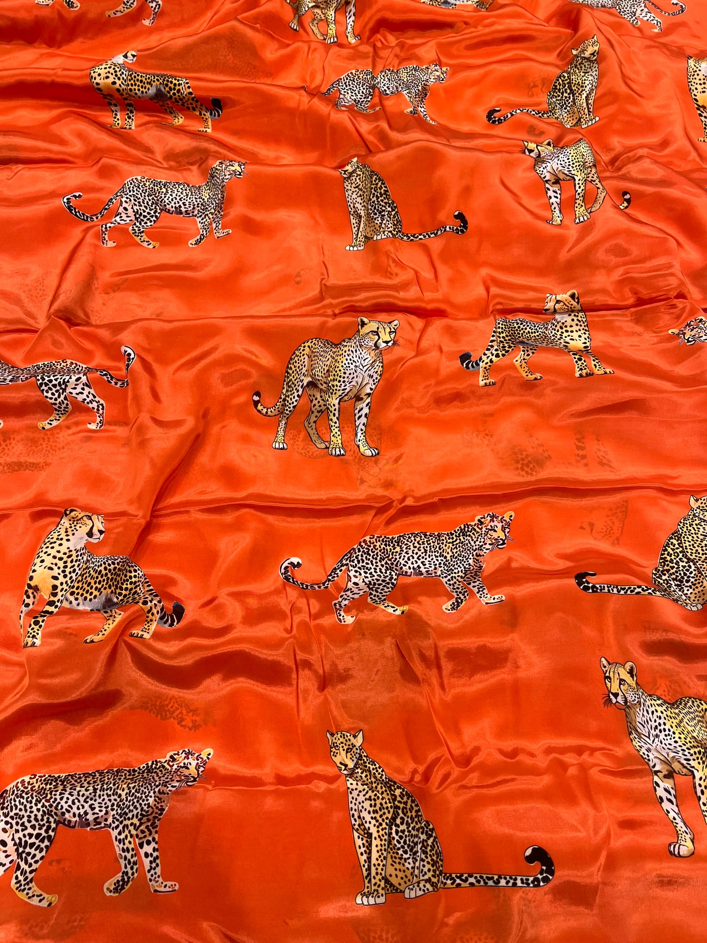 Orange Leopard Viscose Crepe ₹450/- per meter