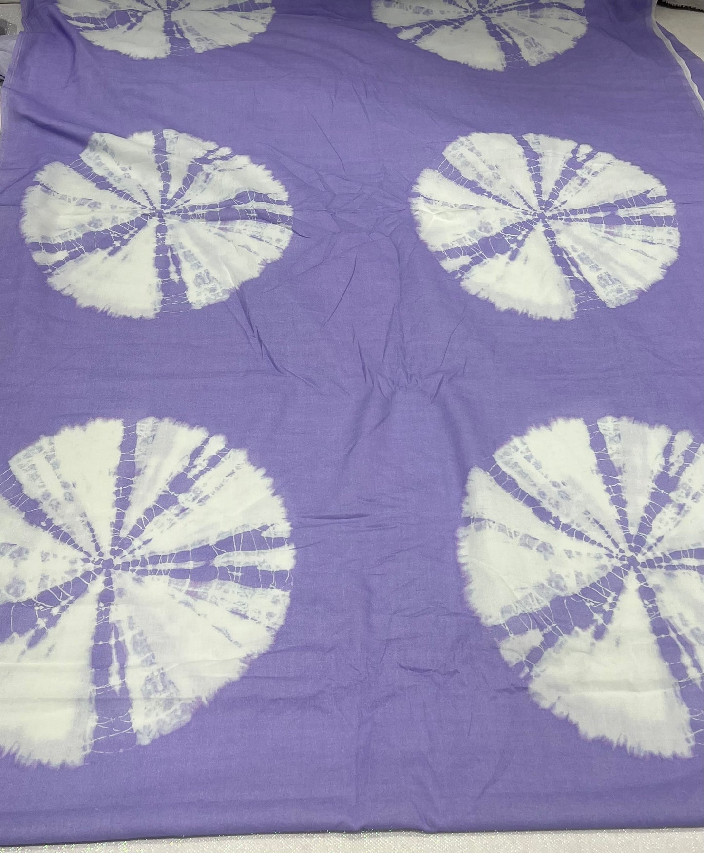 Lavender Circular Burst Lawn Cotton ₹280/- per meter