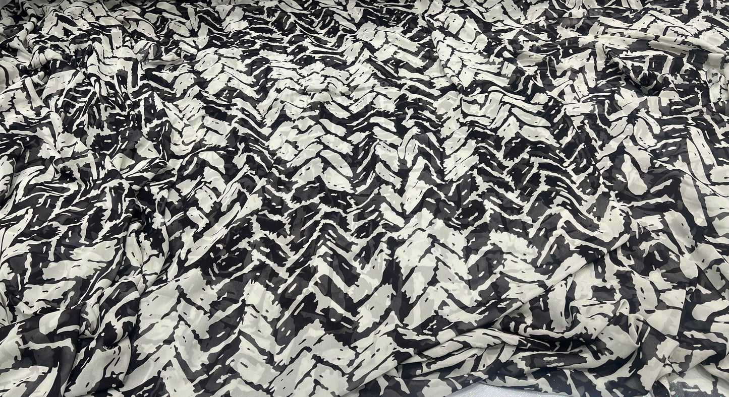 Ebony Swirl Viscos Georgette ₹380 per meter