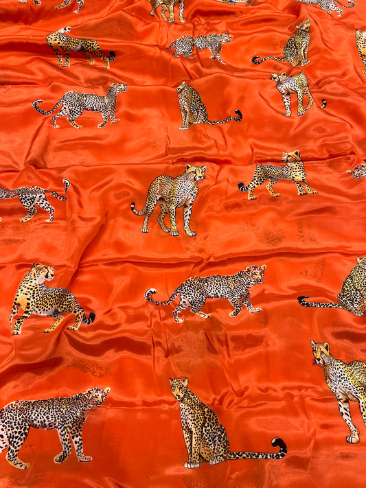 Orange Leopard Viscose Crepe ₹450/- per meter